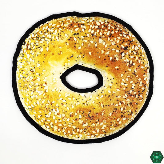Mood Mats Bagel 8", an eco-friendly piece mat made from upcycled materials, featuring a unique bagel design perfect for protecting glass pieces, durable and heat-resistant for long-lasting use, ideal for glass art enthusiasts and collectors.