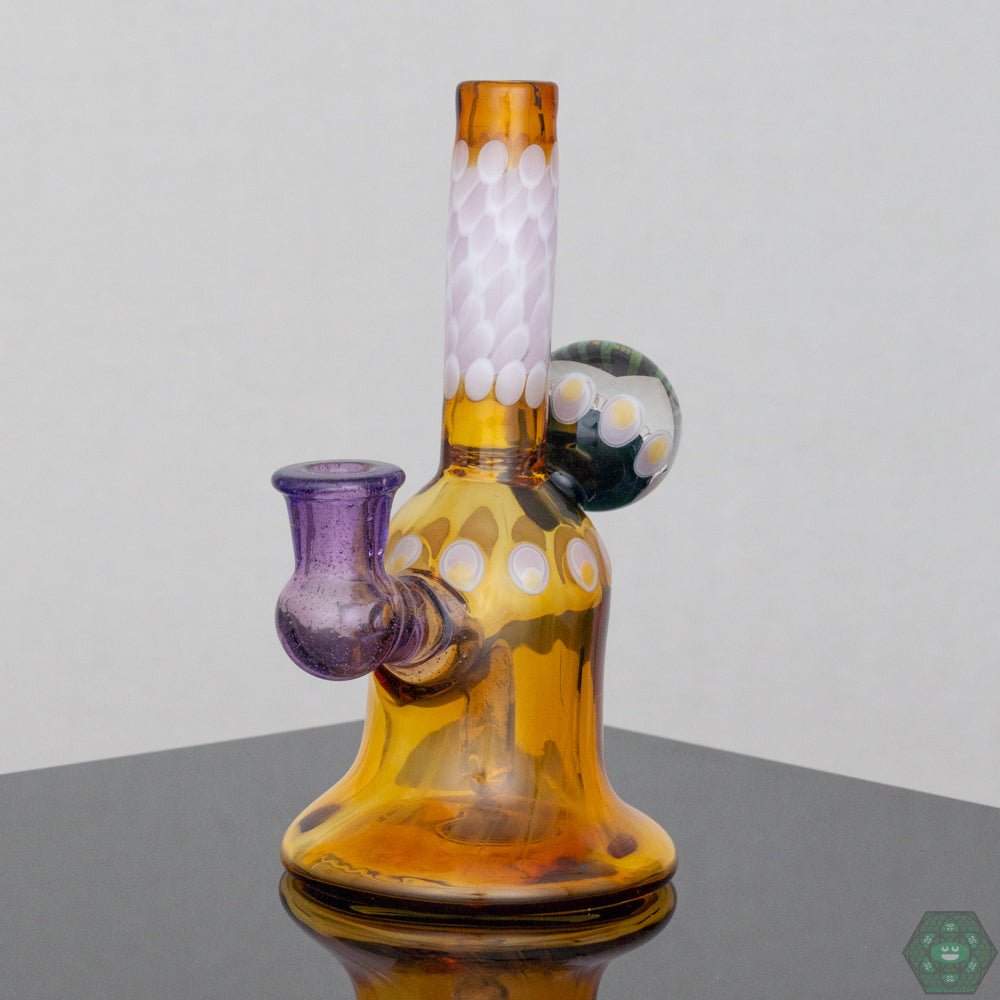 Natrix Glass Mini Tube #10 – Compact 6.5-inch rig with vibrant dichroic accents, ideal for collectors and smokers alike.
