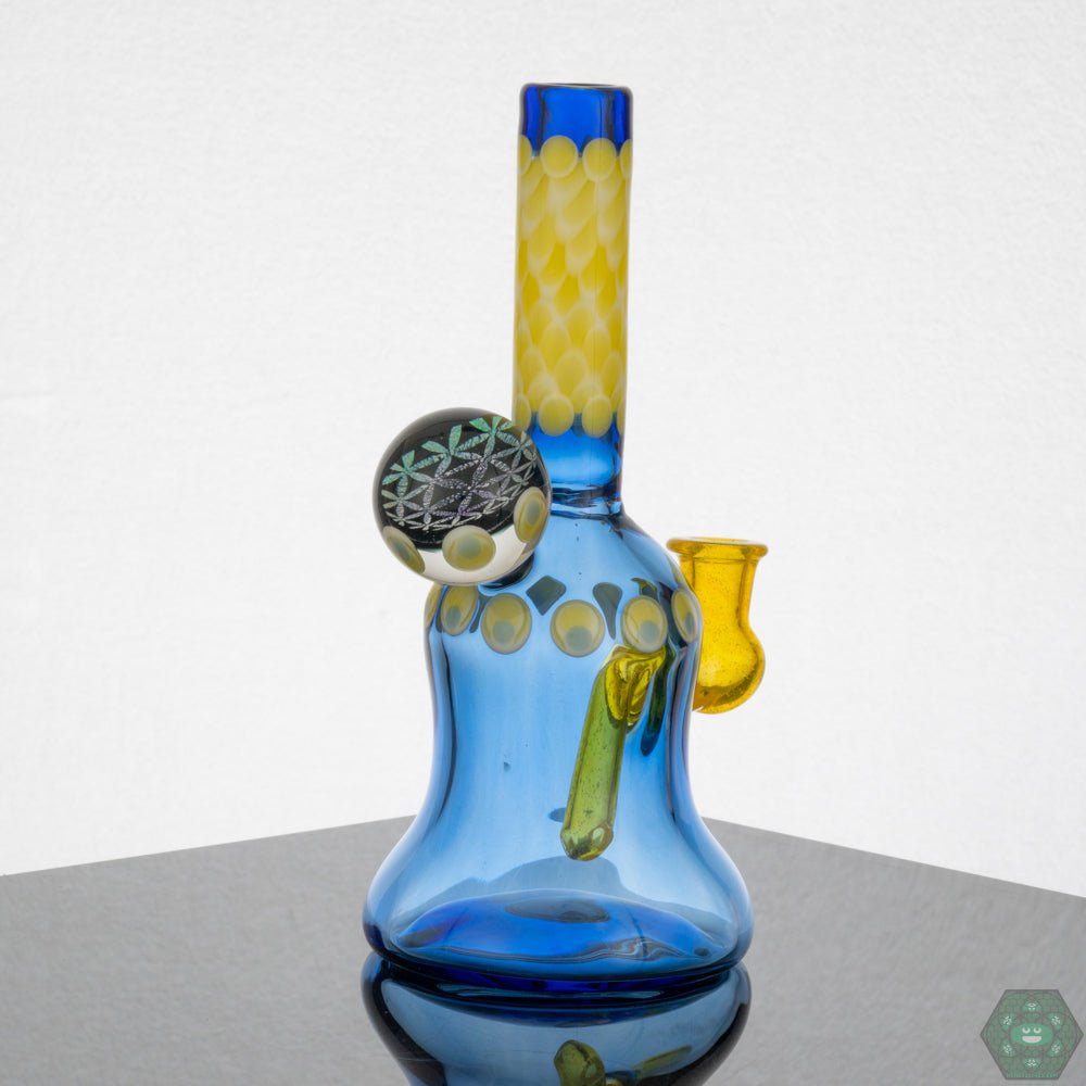 Natrix Glass Mini Tube #8 – Features a 2-hole perc for smooth airflow and premium glass construction for superior performance.