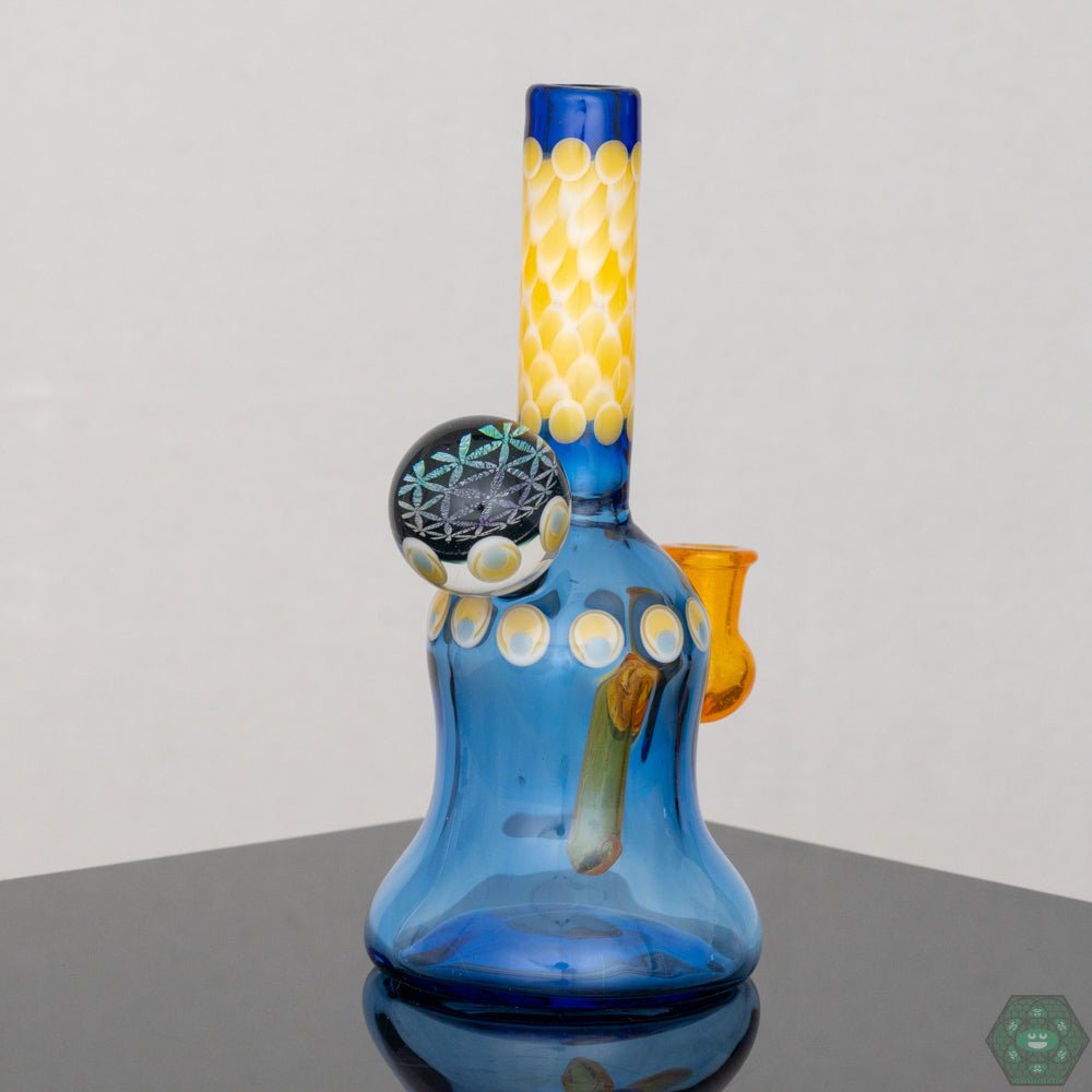 Natrix Glass Mini Tube #8 – Durable glass piece with a 10mm female joint, complete with an authenticity sticker and business card.