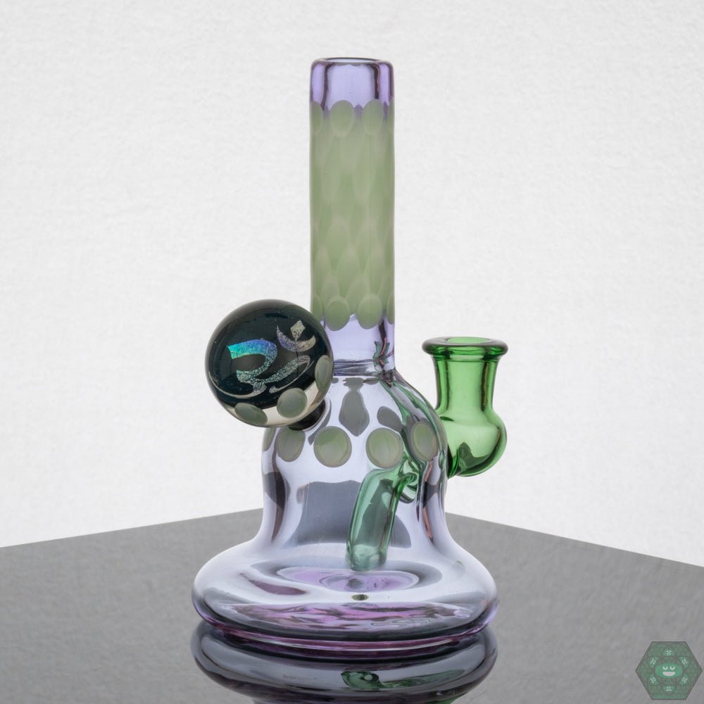 Natrix Glass Mini Tube #9 – 2-hole perc for optimal airflow in a 6.5-inch compact rig, perfect for glass enthusiasts.
