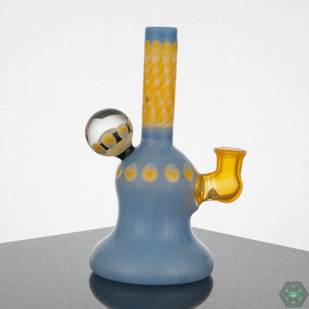 Natrix Glass Mini Tube - Terps Color – Comes with authenticity sticker and business card, making it a collectible piece for enthusiasts.