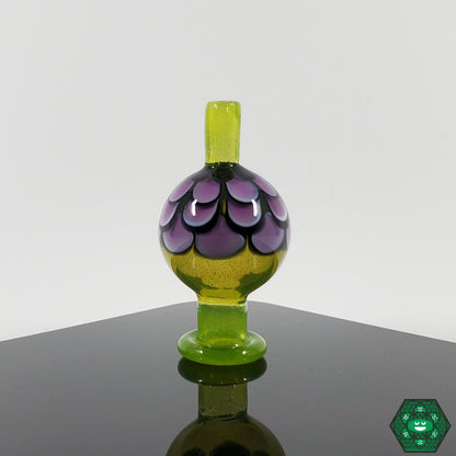 Night WLF Caps, a premium handcrafted glass accessory that adds artistic style to any dabbing setup.