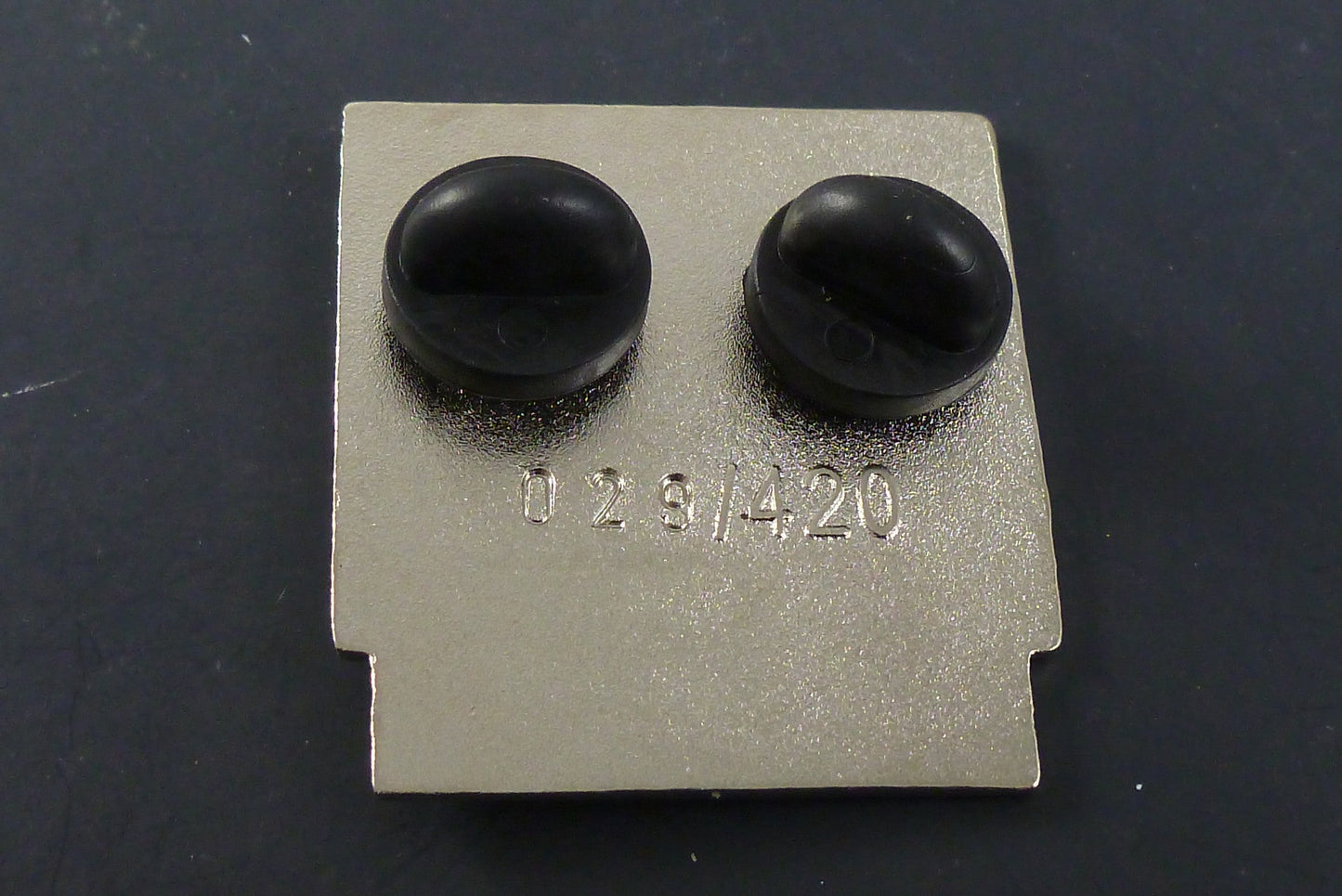 Close-up of the Nintendank Concentrate Pin, showcasing its detailed design and high-quality enamel finish, ideal for adding a quirky touch to any collection.