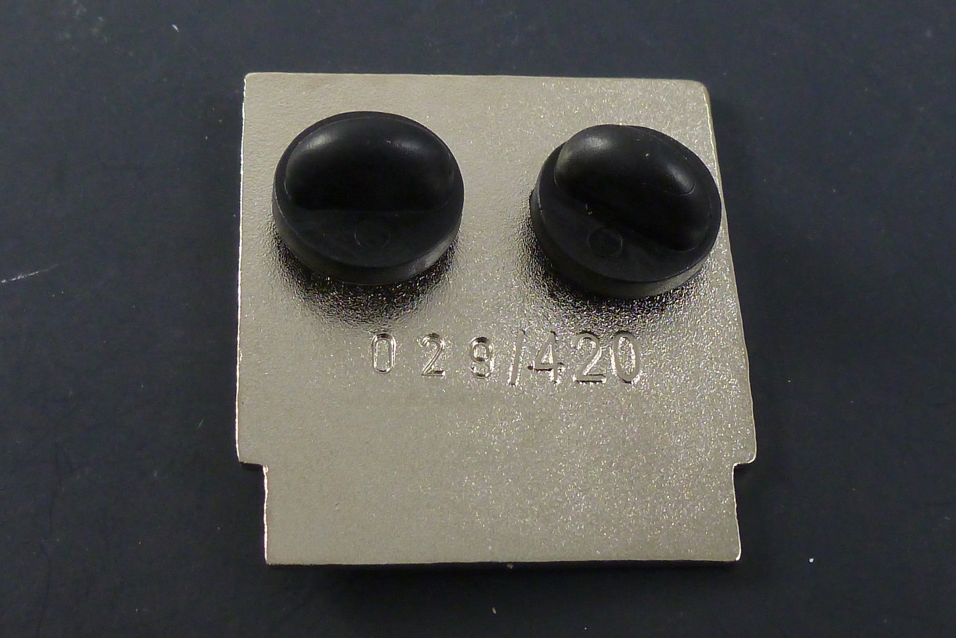 Close-up of the Nintendank Concentrate Pin, showcasing its detailed design and high-quality enamel finish, ideal for adding a quirky touch to any collection.