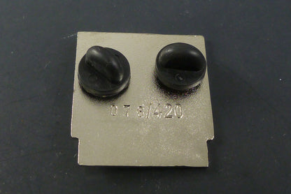 Close-up of the Nintendank Globberman Pin, showcasing its bold design and high-quality enamel finish, ideal for adding a nostalgic touch to any collection.