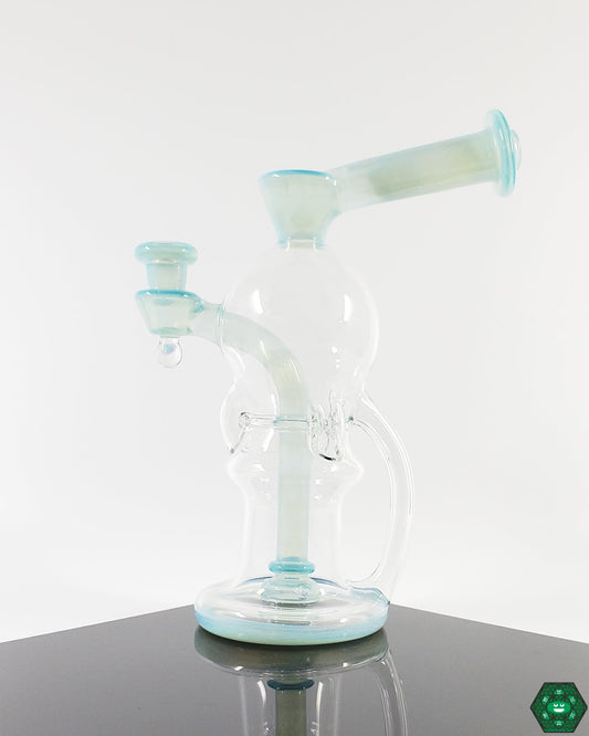 OM Glass Co Blooper, an elegant recycler featuring a Zen over white satin finish, triple uptake, and single drain, designed for consistent, high-quality airflow and a refined aesthetic.


