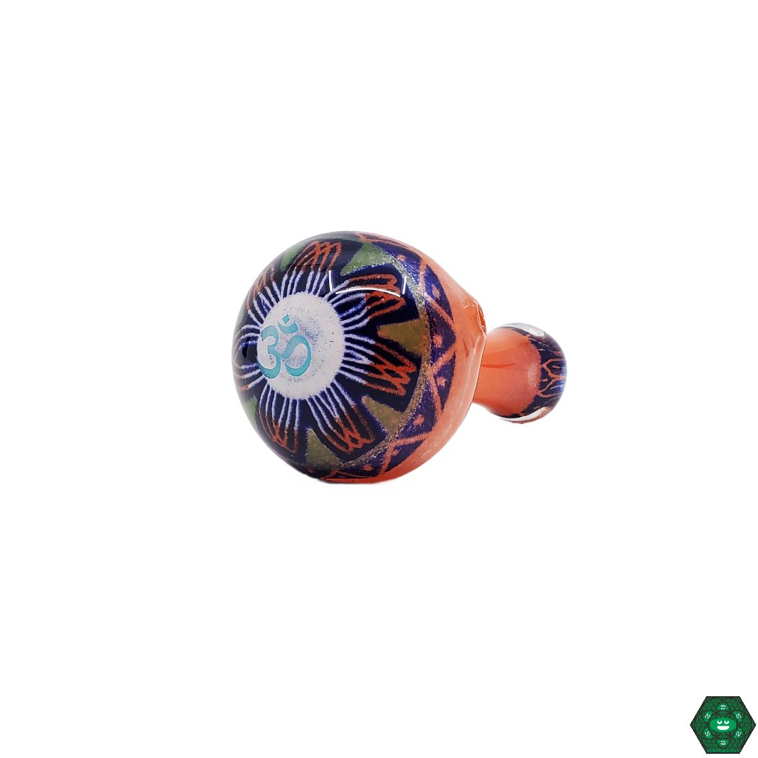 OM Glass Spoon Pipe, made from high-quality glass featuring intricate artistic details for a stylish and functional smoking experience.