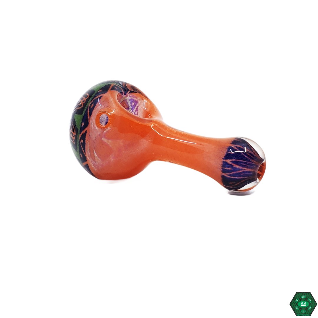 OM Glass Spoon Pipe, a unique and collectible glass pipe designed for enthusiasts who appreciate artistic craftsmanship.