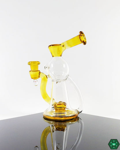 OM Glass Co Water Slide, a precision recycler combining unique flow with smooth, enjoyable dabbing, a great choice for enthusiasts who prioritize sleek design and function.