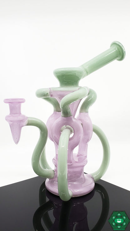 OTW Glass Encased Bubblegum TDTDR Recycler – 10mm joint, 7-hole perc, and includes an authenticity sticker and card, perfect for collectors.