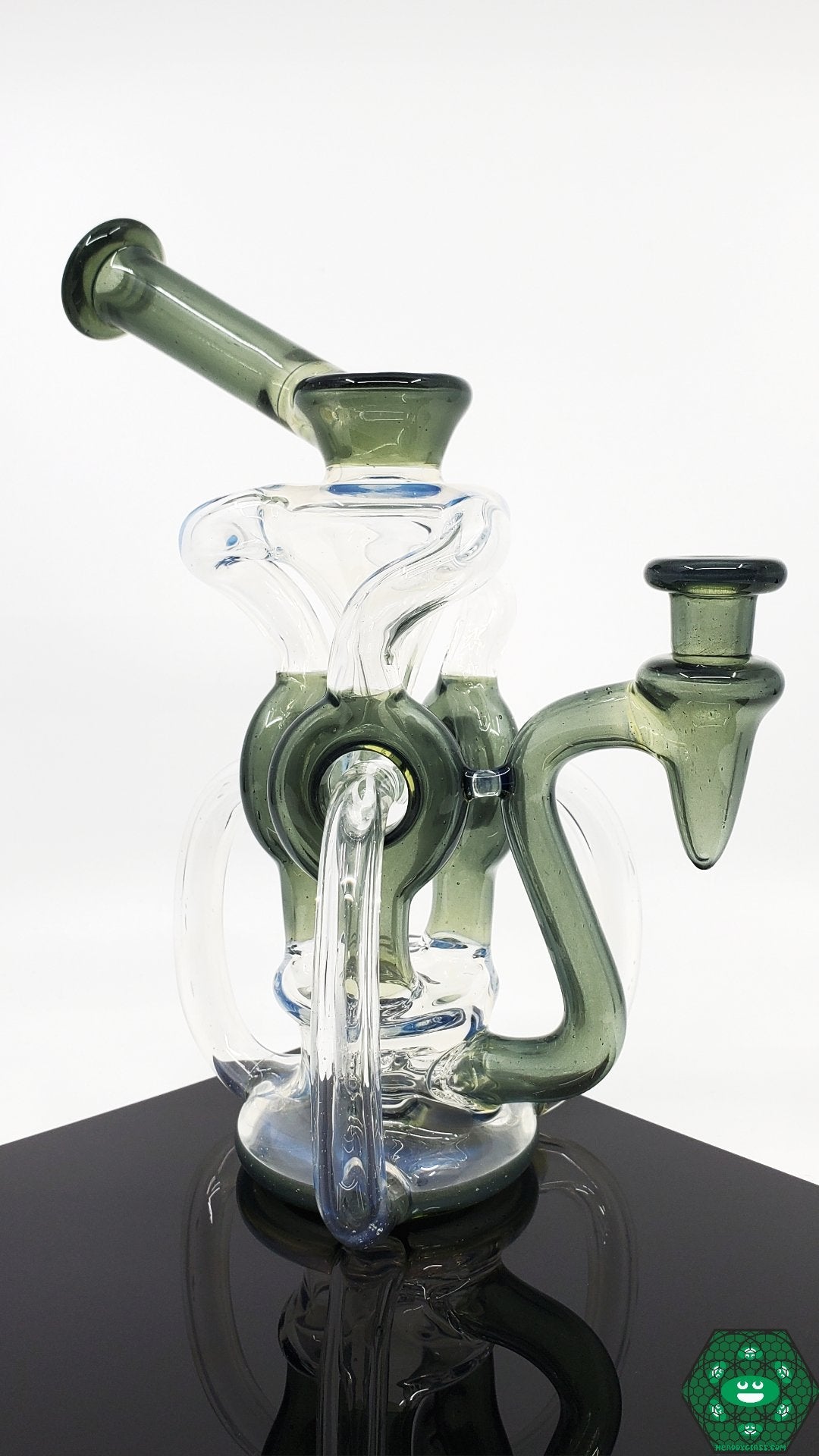 OTW Glass Ghosted Ghost TDTDR Recycler – 8-inch recycler with 7-hole perc and comes with an authenticity sticker and business card for added value.

