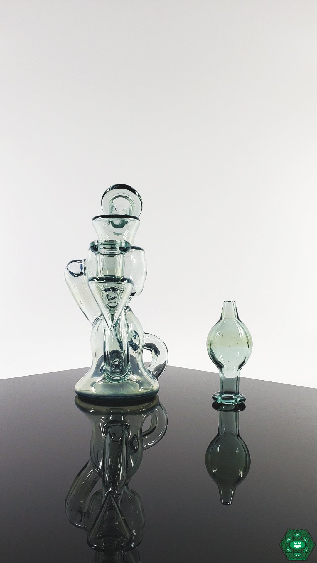 Portable Glass Rig: The Professor Dank Mini Klein Recycler, offering smooth dabs in a compact and travel-friendly design.