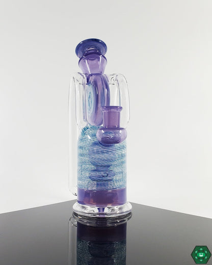 Premium Glass Recycler Rig: The Cerio Glass Double Vertical Recycler, made from high-quality borosilicate glass and designed for optimal performance.


