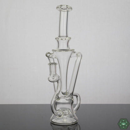 Prophecy Glass Recycler #9, 14MM dual uptake dab rig with artistic design and smooth pulls, sleek and artistic, dual uptake for smooth, continuous hits, 14MM joint for versatility, perfect for those seeking function and aesthetic.


