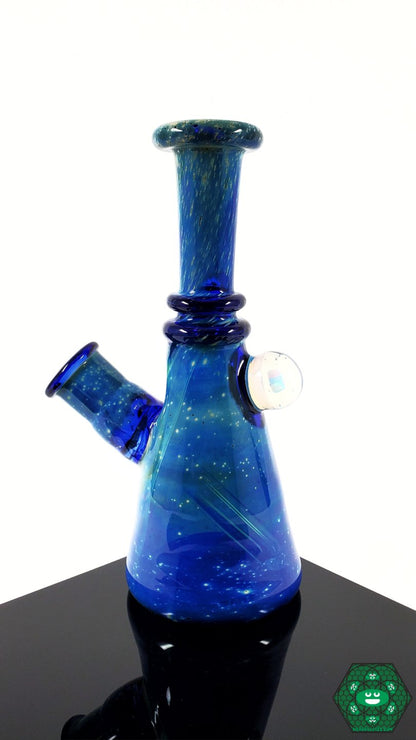 Raya Glass Mini Tube – Space theme with 2-hole perc, 14mm joint at 45-degree angle, and smooth filtration for a stylish dabbing experience.