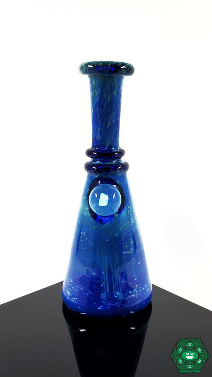 Raya Glass Mini Tube – Artistic space-themed design with opal detail, 6.25-inch size, and 2-hole perc for smooth, flavorful hits.