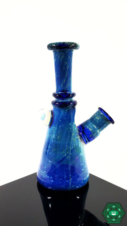 Raya Glass Mini Tube – Space theme with artistic design, 14mm female joint at 45-degree angle, compact 6.25” height, perfect for any glass collection.

