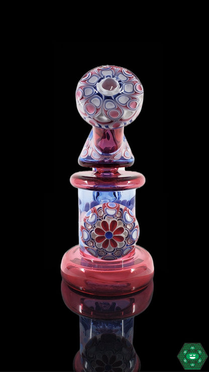 RL Dots Glass Art: The Kickback Jammer showcases RL Dots' signature glass artistry with its unique dot stack marble accent and high-quality craftsmanship in a functional 14mm dab rig.