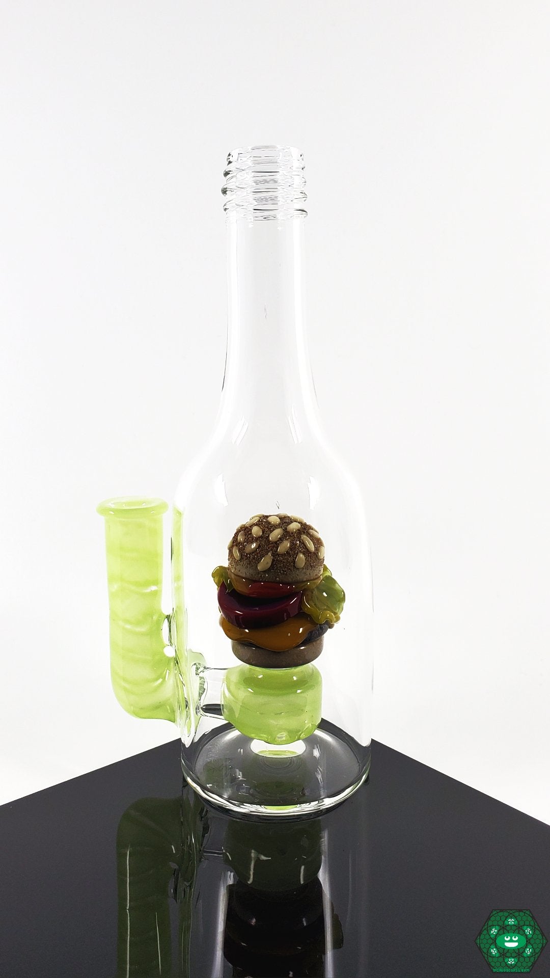 Rosburg Glass Bottle Rig – Slyme Edition with a 10mm joint, combining sleek aesthetics and functionality for a standout dab rig.