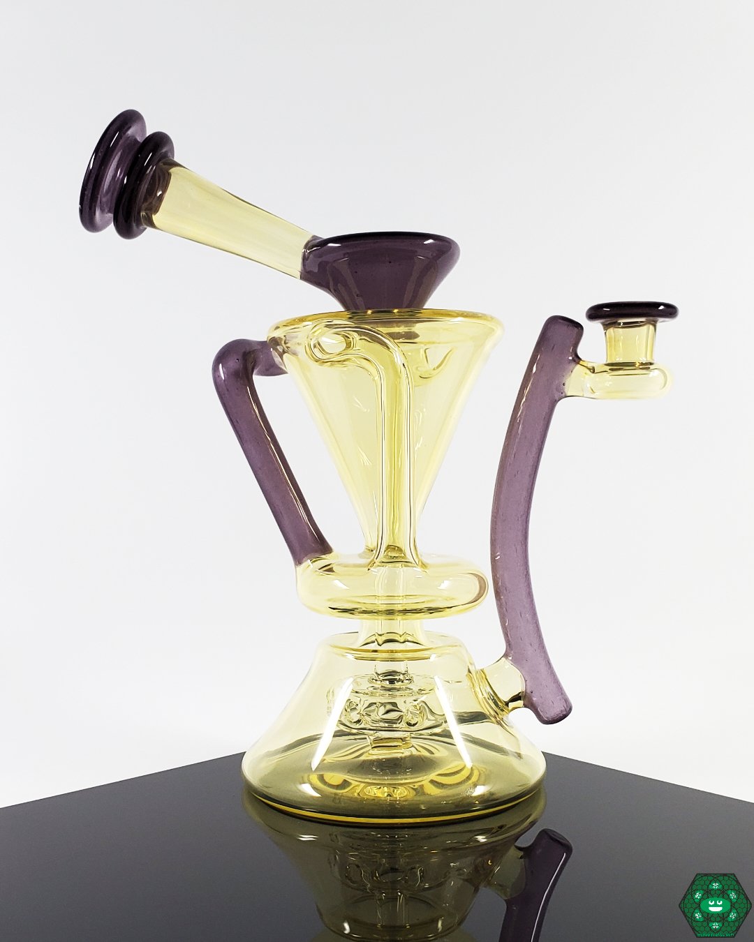 Silver Serum Recycler: The McGrew Glass Silver Serum Recycler, a unique glass rig designed for optimal filtration and smooth hits.
