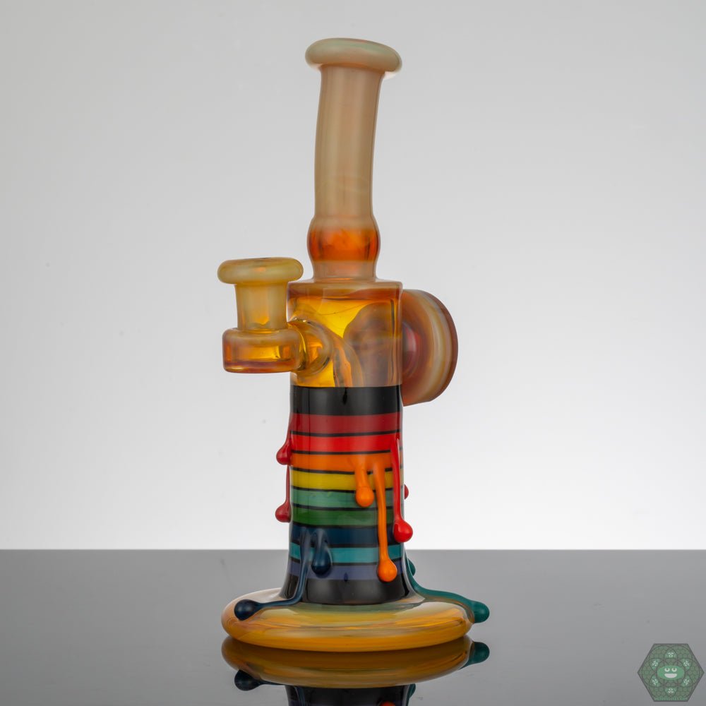 Skrillinger NS Yellow Exploding Candle, a vibrant glass concentrate rig with a bold yellow design.