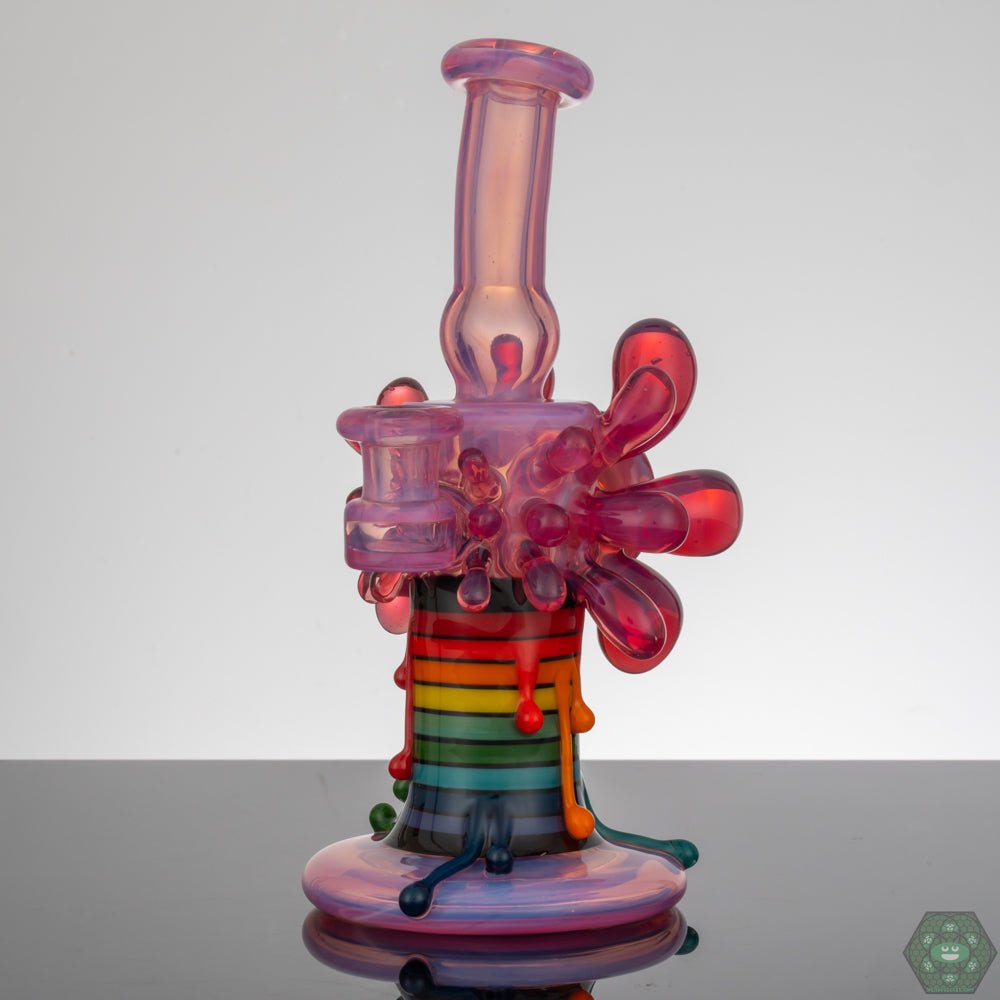 Durable borosilicate glass Skrillinger Telamagenta Exploding Candle, combining art and utility.