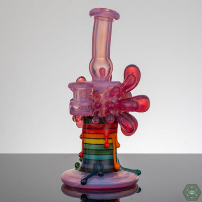 Durable borosilicate glass Skrillinger Telamagenta Exploding Candle, combining art and utility.