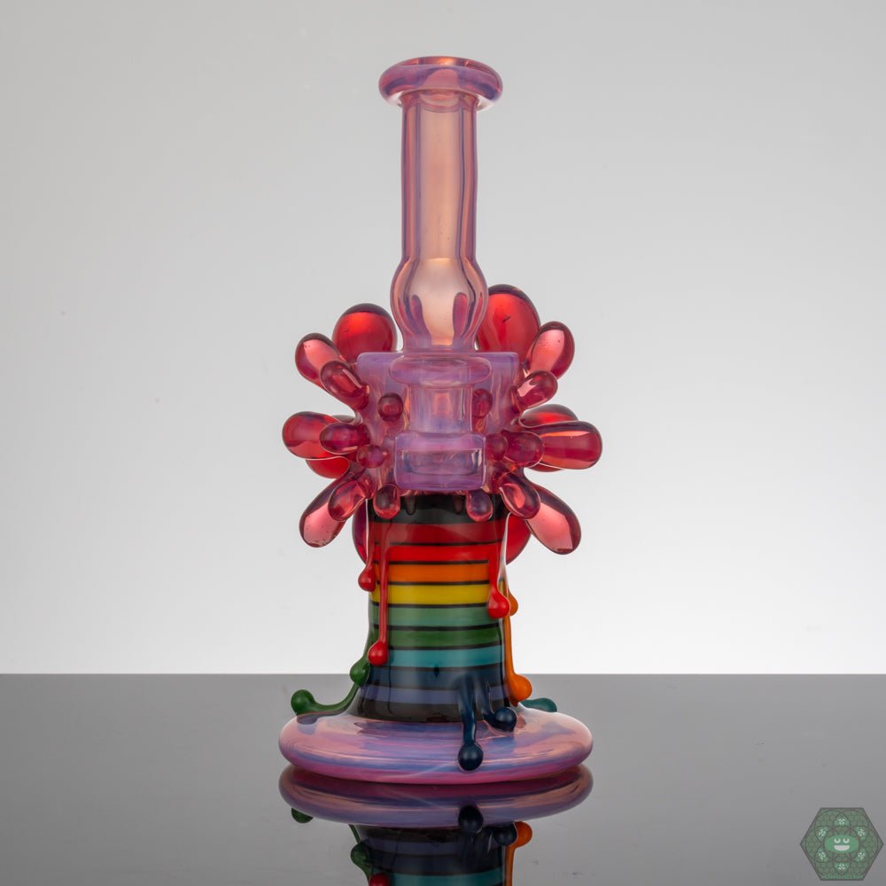 Skrillinger Telamagenta Exploding Candle – a stunning glass art piece with an intricate explosion design.