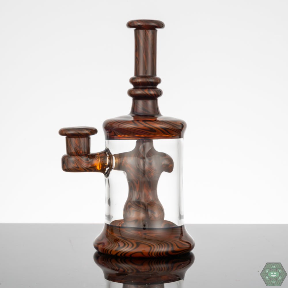 Small Glass Rig with Bubble Cap: The Kaleb Folck BBiB #25 is a compact 5-inch rig and includes a matching bubble cap for enhanced functionality and aesthetic appeal.