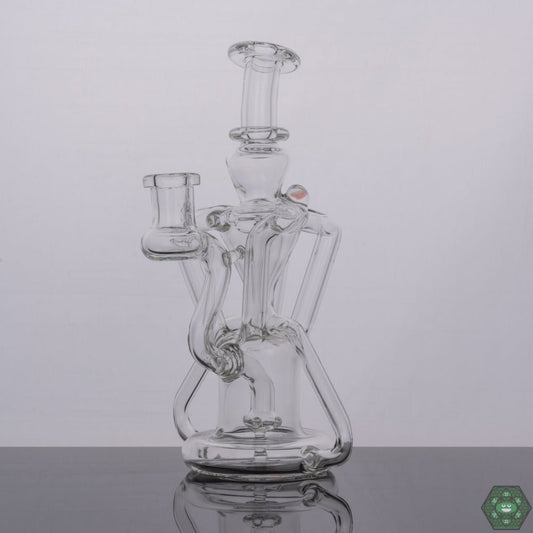 Clear Recycler by Spunout Glass, a compact, high-performance recycling rig designed for top-notch recycling action to enhance concentrate sessions, featuring a clean, minimalistic design and efficient water filtration, perfect for daily use, handcrafted for balance and function, combining durability and elegance in one exceptional piece.