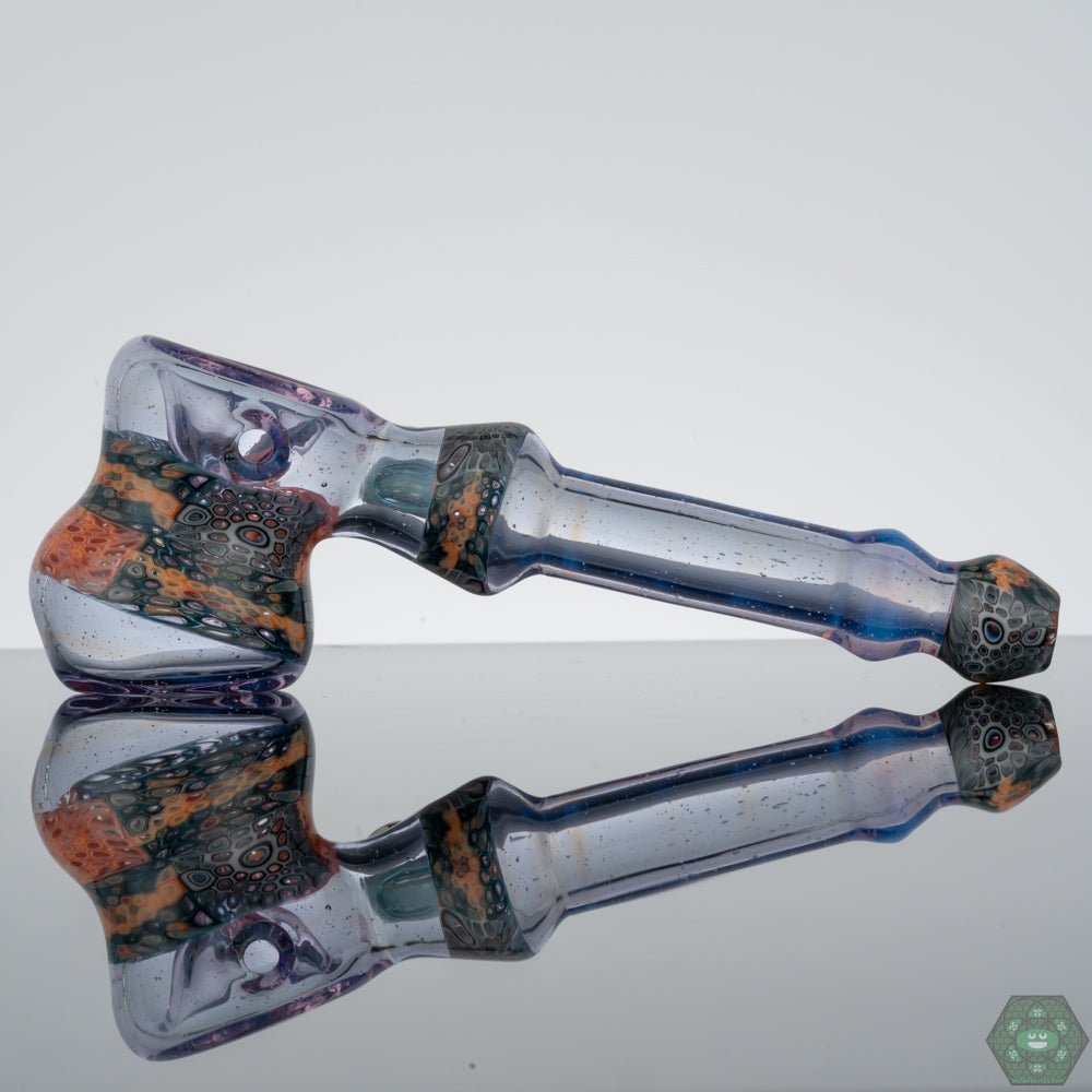Stacked Glass Hammer Pipe: The Middleton Glassworks Chip Stacked Hammer features a unique layered glass design, creating a visually appealing and distinct aesthetic.