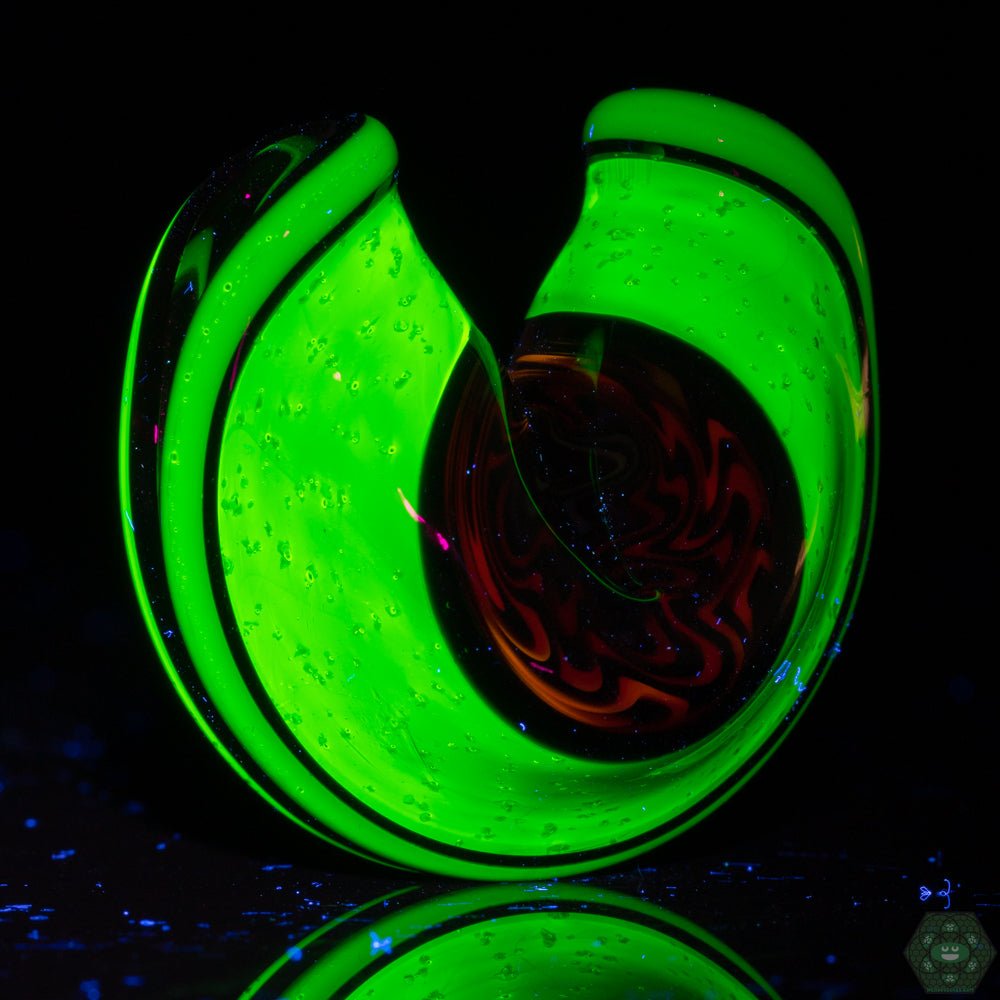 Statement Pendant Glass Art: This pendant is more than just an accessory; it's a statement piece, perfect for those who appreciate unique glass art and want to add a playful yet artistic touch to their style.