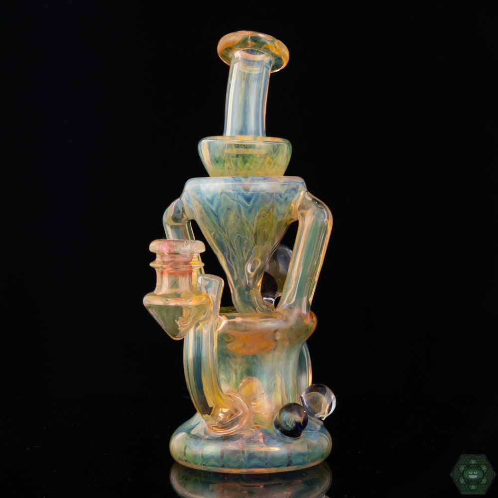 STF Glass Fumed Recycler #1, an elegant 10mm fumed dab rig featuring a unique single uptake design, combining elegance and functionality, its fumed finish creates a beautiful effect, perfect for enthusiasts who appreciate artistry.