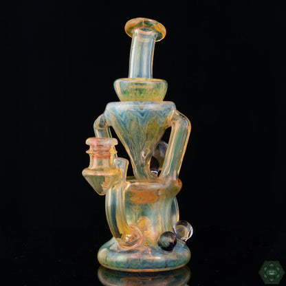 STF Glass Fumed Recycler #1, an elegant 10mm fumed dab rig featuring a unique single uptake design, combining elegance and functionality, its fumed finish creates a beautiful effect, perfect for enthusiasts who appreciate artistry.