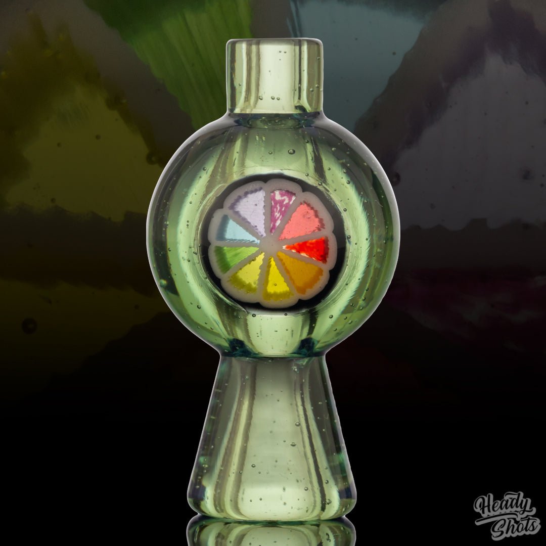 Stylish Glass Bubble Carb Cap by J Fell, adding a touch of elegance to your dab rig setup.