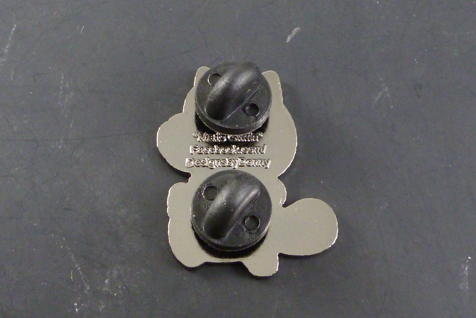  Close-up of the Super Griffin Pin, showcasing its imaginative and high-quality enamel design, ideal for adding a playful and colorful touch to any collection.