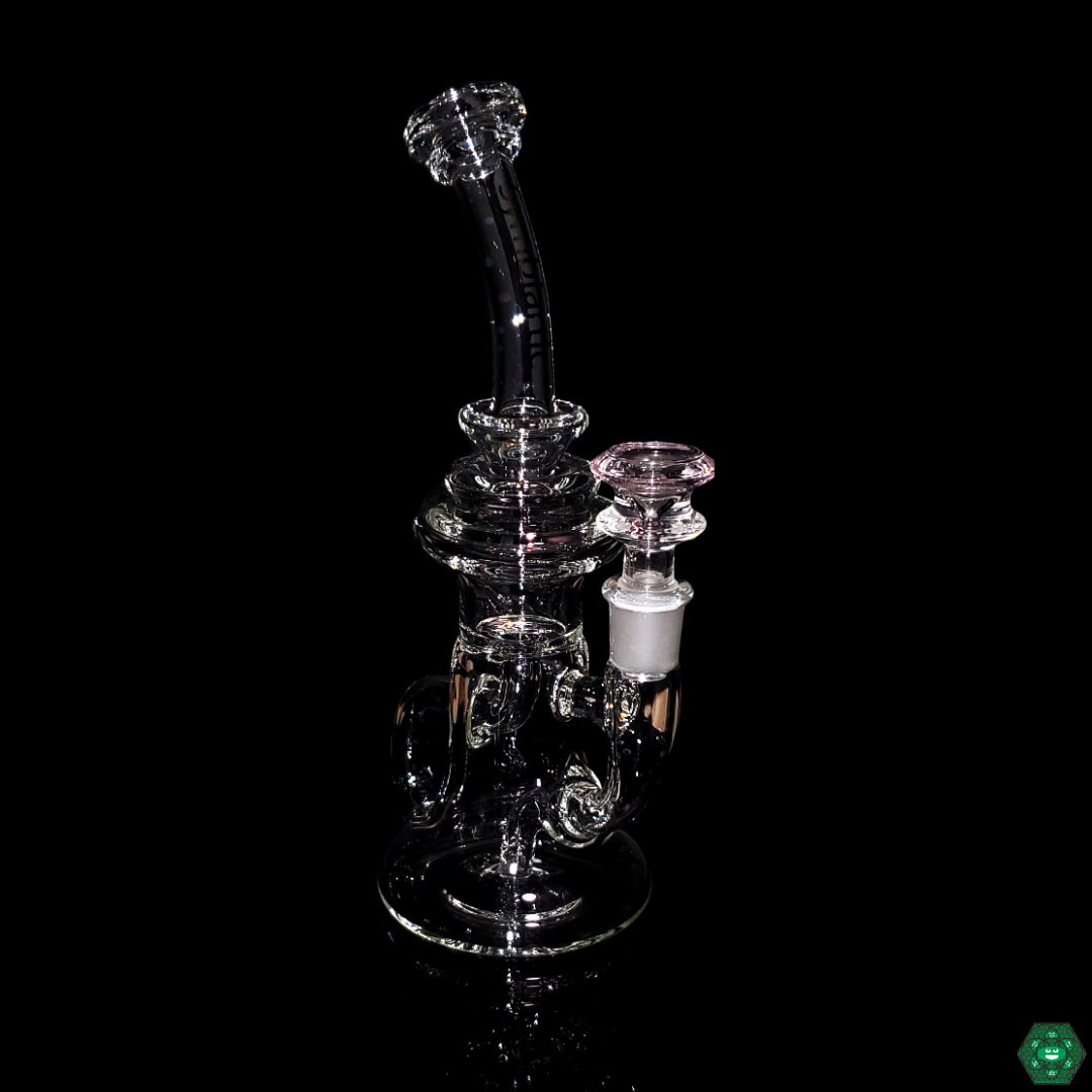 Symbiartic Glass 8" Klein in use, demonstrating its efficient 6-hole perc filtration system for smooth, powerful hits during a dabbing session.