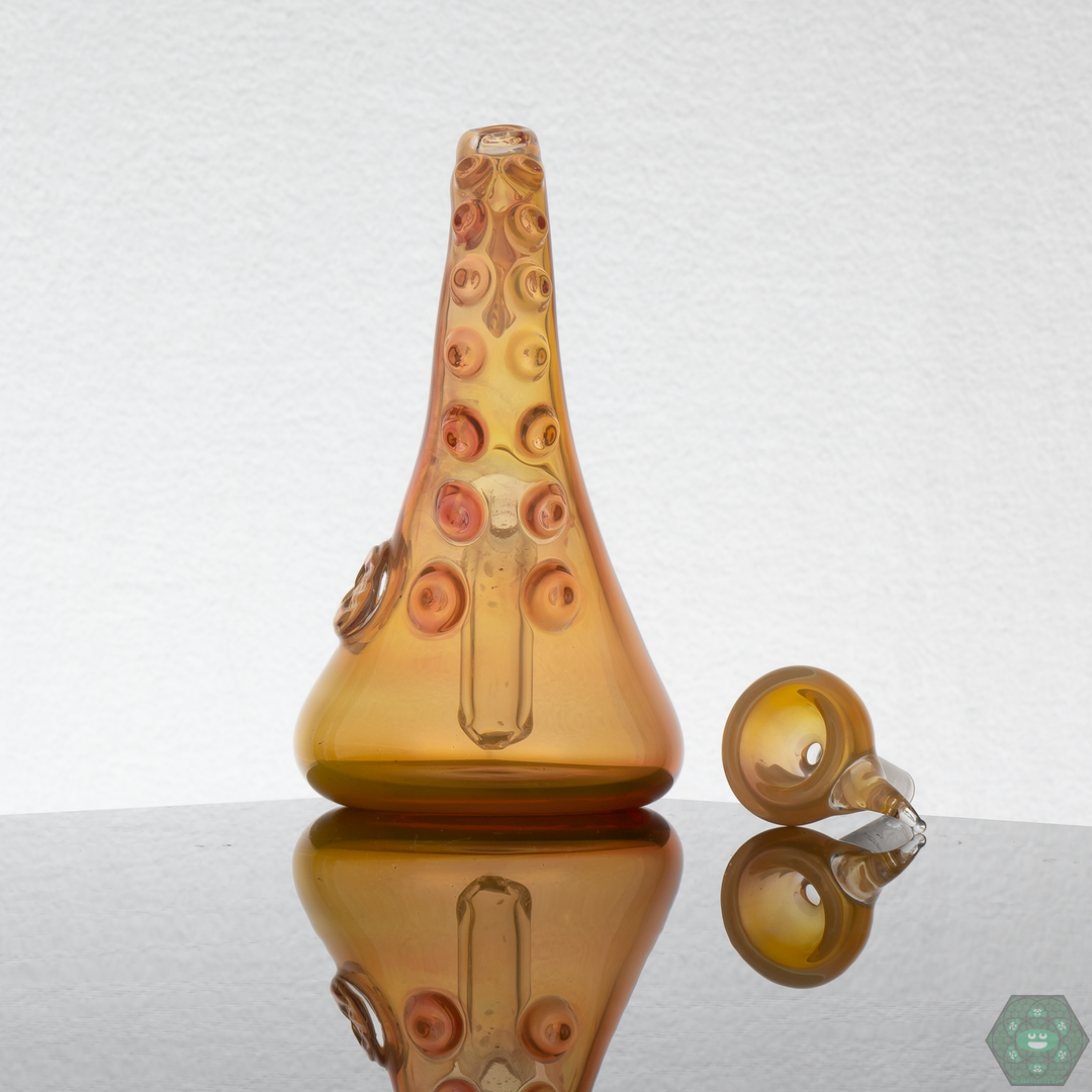 The Wicked Glass Tentacle Traveler in use, demonstrating its smooth functionality and efficient vaporization.