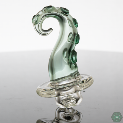 Tentacle Spinner Cap by Wicked Glass, demonstrating its innovative spinner mechanism for even airflow distribution and improved dabbing experience.