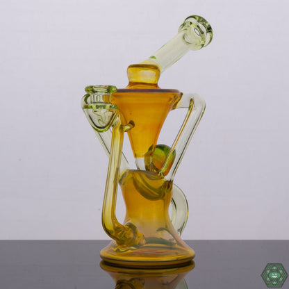 Torch D Boro Floating Recycler, a premium borosilicate glass dab rig with a unique recycler design, featuring a sleek color combo for smooth and flavorful hits with advanced recycling action, a stable base, and a comfortable mouthpiece, ideal for enthusiasts seeking both style and performance.