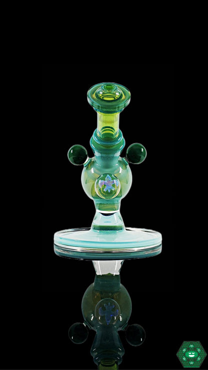 Two-Hole Perc Glass Rig: The Cajun Glass Full-Color Heliosphere features a unique two-hole percolator for smooth hits and enhanced filtration in a vibrant and eye-catching design.