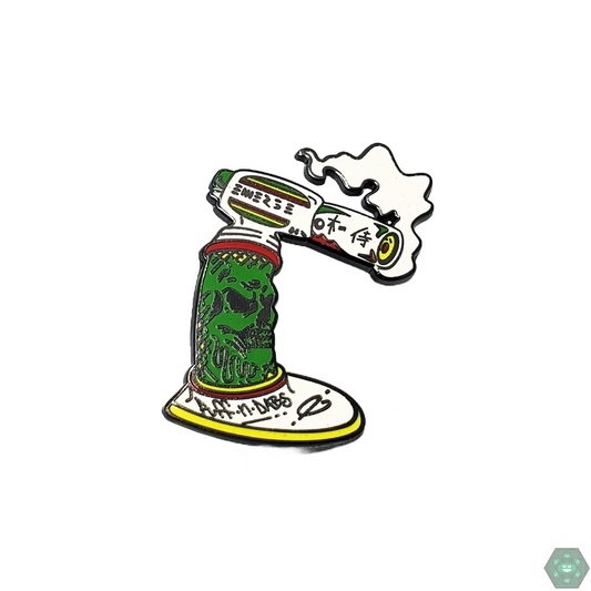 Unique Rasta Torch Pin by Puff n Dabs, featuring vibrant red, green, and yellow hues, perfect for adding a reggae-inspired touch to bags, hats, or clothing.