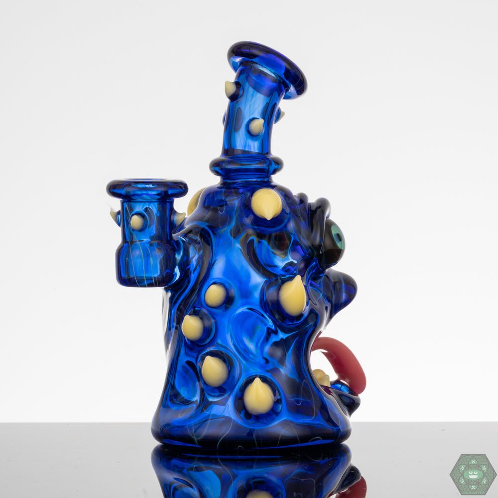  UV Reactive Glass Rig: The Kaleb Folck GPPR Open Mouth #337 features UV-reactive detailing, adding a unique and eye-catching element to this artisanal glass piece.