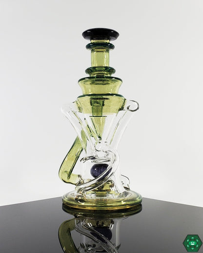 V2 Double Recycler with Triple Drain: The Cerio Glass V2, designed for enhanced airflow and smooth, filtered hits with its dual uptake and 4-hole percolator.
