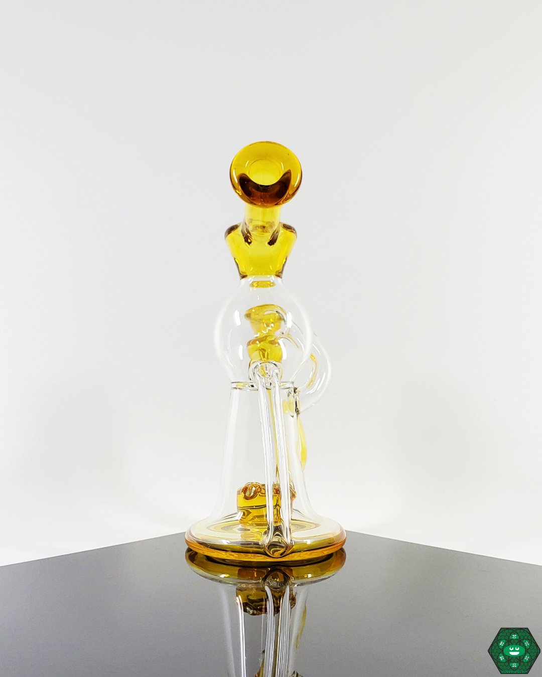 Water Slide Precision Recycler: The OM Glass Co Water Slide, designed for smooth and enjoyable dabbing with its unique flow and sleek design, ideal for enthusiasts who value function.