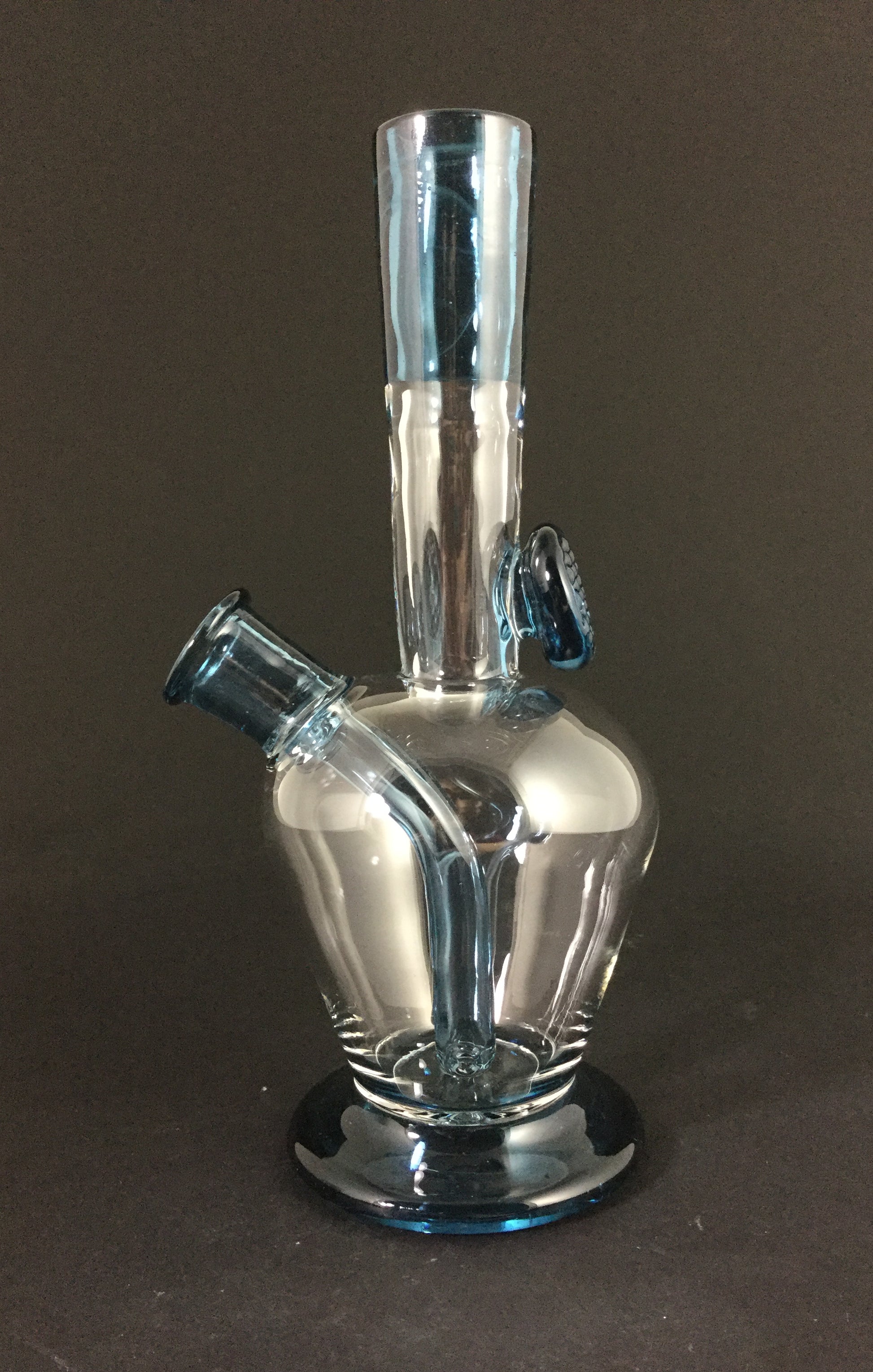 Whitney Harmon Minitube, a premium glass piece crafted with meticulous attention to detail and renowned reliability.




