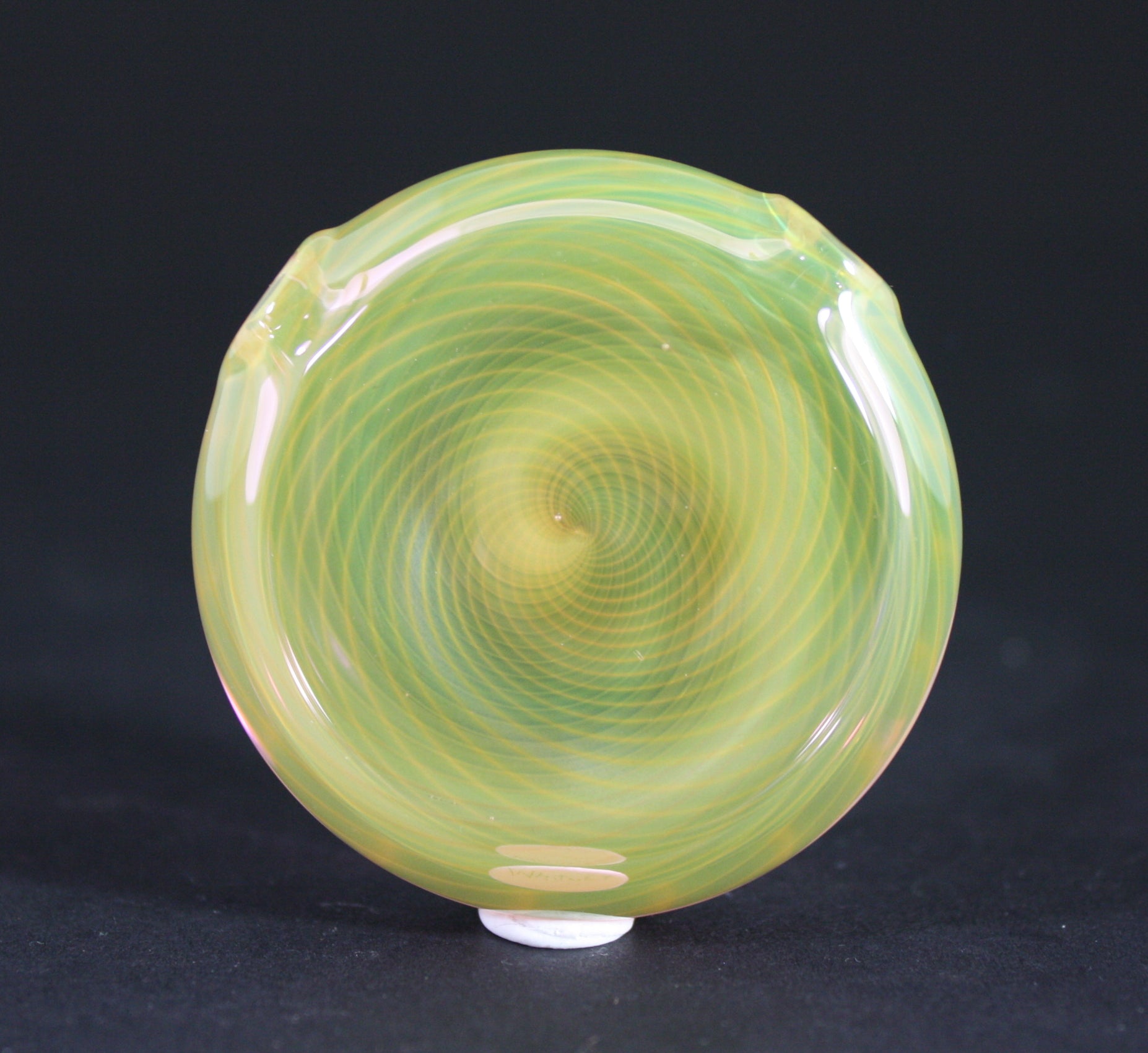 Whitney Harmon Wearable Art: A glass pendant that combines artistic expression with everyday style.