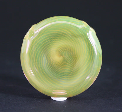 Whitney Harmon Wearable Art: A glass pendant that combines artistic expression with everyday style.