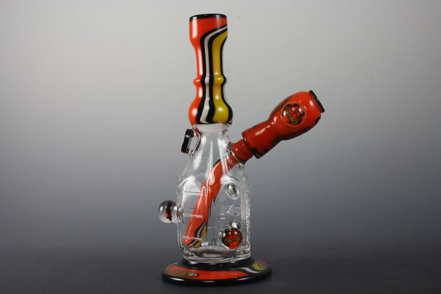 6-hole fixed downstem on Whitney Harmon glass pieces.